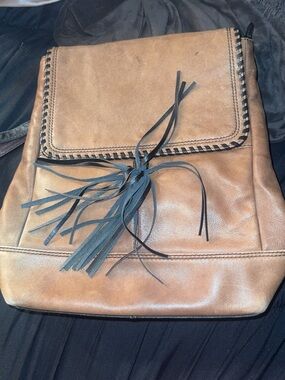 brown leather book bag
